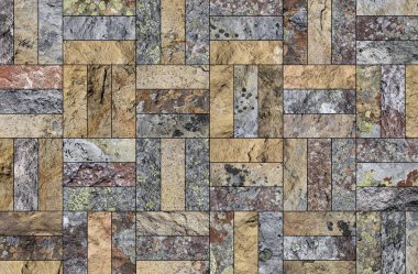 Bir taş doku şeklinde bir desenli seramik karo döşeme parçası.