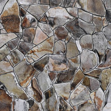 Çatlamış bir taştan bir duvar parçası.