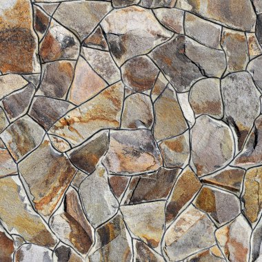 Çatlamış bir taştan bir duvar parçası.