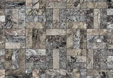 Bir taş doku şeklinde bir desenli seramik karo döşeme parçası.