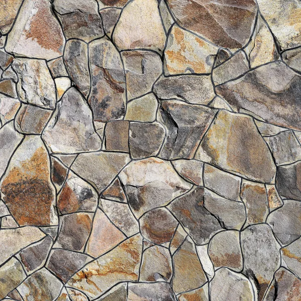 Çatlamış bir taştan bir duvar parçası.