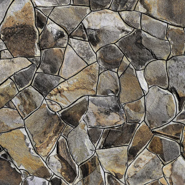 Çatlamış bir taştan bir duvar parçası.