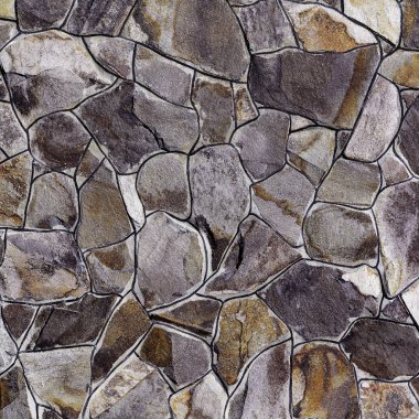 Çatlamış bir taştan bir duvar parçası.