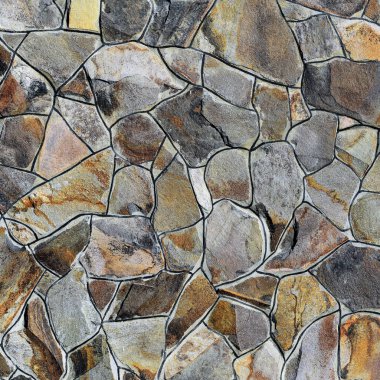 Çatlamış bir taştan bir duvar parçası.