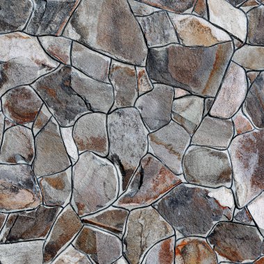 Çatlamış bir taştan bir duvar parçası.