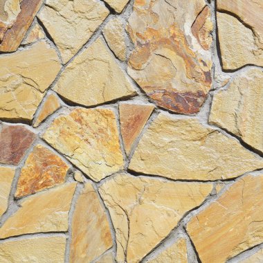 Çatlamış bir taştan bir duvar parçası.