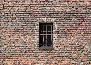 window with red brick wall. old architecture.