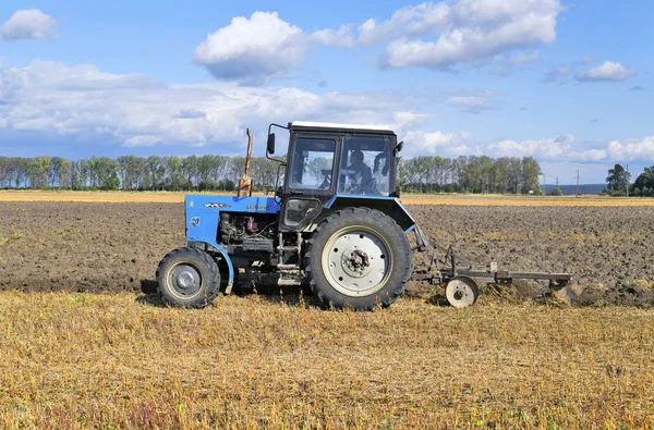 Tractor Plowing Field Agricultural Equipment — Photo