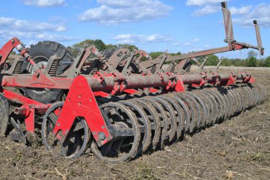 tractor plowing the field, agricultural equipment
