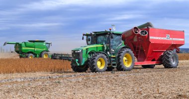agricultural machinery working at rural field
