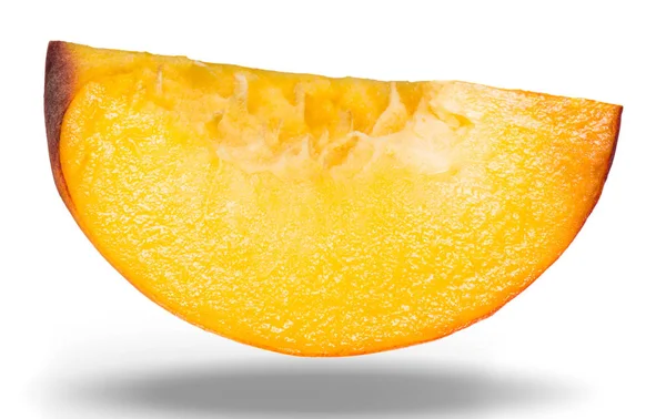 Peach slice isolated. Peach slice on white. Peach. With clipping path.