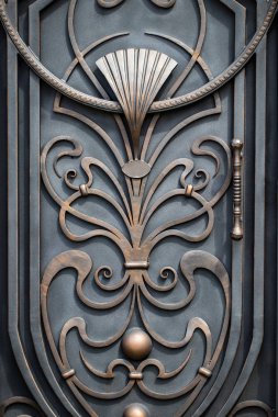 wrought-iron gates, ornamental forging, forged elements close-up. clipart