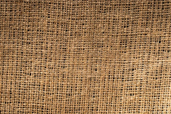 黄麻布のテクスチャです 繊維の背景をクローズ アップ マクロ — ストック写真
