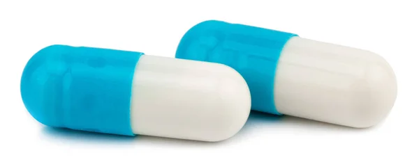 Капсулы Таблетки Изолированы Белом Фоне Обрезанием Пути — стоковое фото