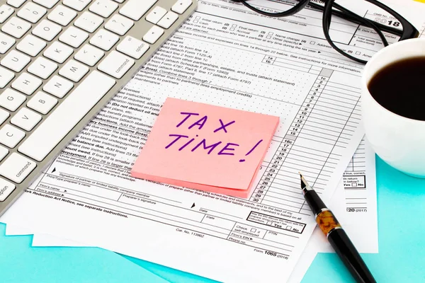 Tax time - Notification of the need to file tax returns, tax form at accauntant workplace.