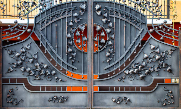 Beautiful decorative metal elements forged wrought iron gates.