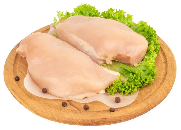 Raw chicken breast fillets on wooden cutting board isolated on — Stock Photo, Image