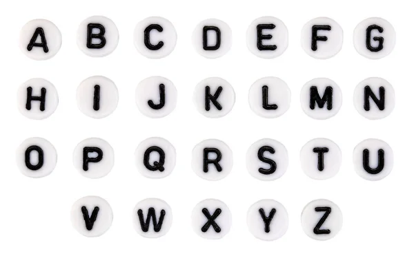 Contas de plástico alfabeto isolado em um fundo branco — Fotografia de Stock