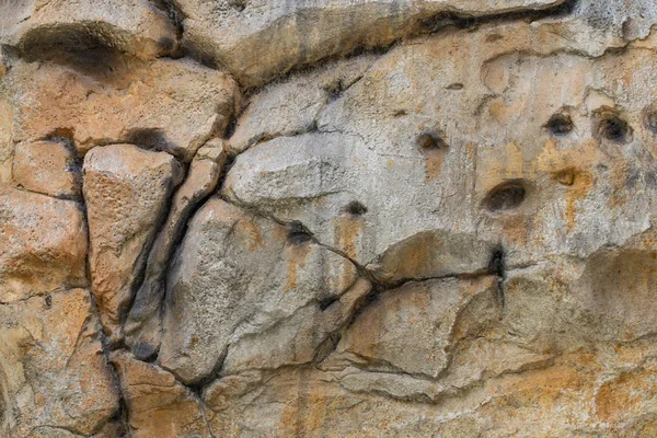 Structuur van het oppervlak van de steen, gebruikt als achtergrond. Stone tex — Stockfoto