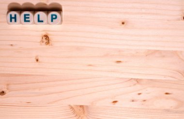 Boş açık renkli ahşap bloklar halinde üst kısmındaki yardım dile kelime ile bu şablon görüntü doldurur. 