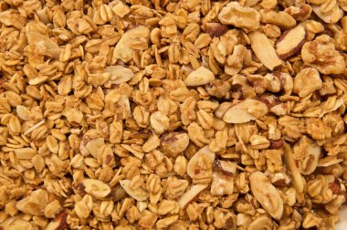 Üzerinde home made, tüm doğal, organik granola aşağı bakıyor. Mısır gevreğini görüntünün tamamının doldurur.