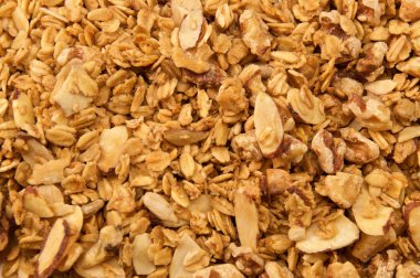 Üzerinde home made, tüm doğal, organik granola aşağı bakıyor. Mısır gevreğini görüntünün tamamının doldurur.