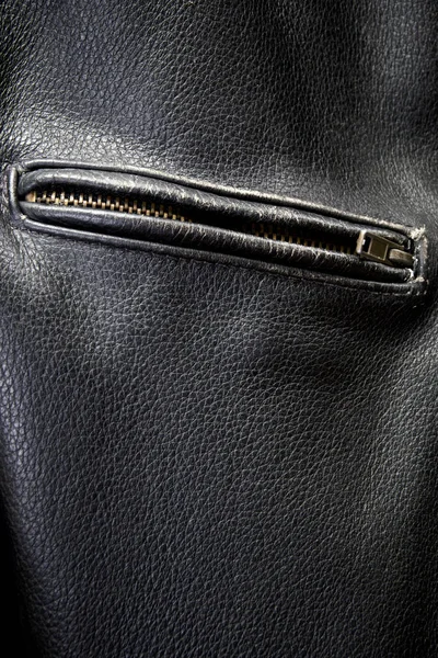 Close Old Black Leather Motorcycle Jacket Focusing Zippered Pocket — Stock Photo, Image
