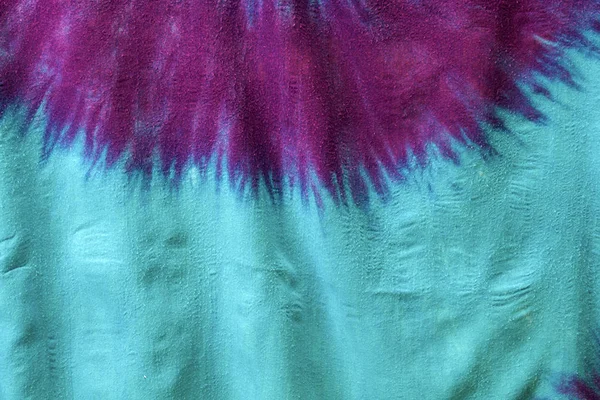 Zbliżenie Multi Kolorowe Farbowanej Tkanina Tło Wyświetlono Starburst Różowy Fioletowy — Zdjęcie stockowe