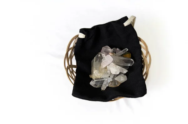 Numerous Clear Quartz Crystal Points Black Drawstring Pouch Wicker Basket — Stock Photo, Image