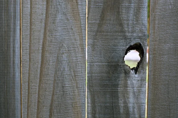 Close Old Wooden Fence Open Knothole Creating Large Peephole — Stock Photo, Image