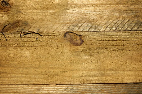 Raue, knorrige Holzplankenkulisse aus nächster Nähe — Stockfoto