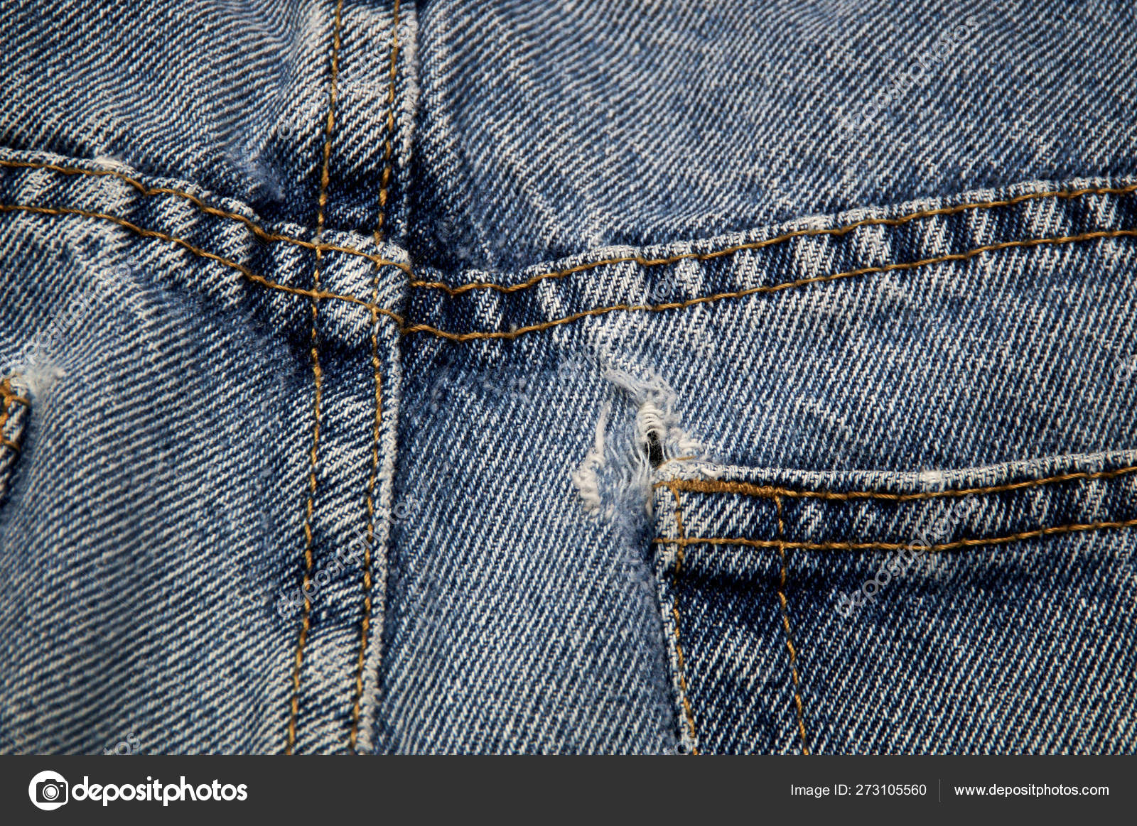 hole in jeans back pocket