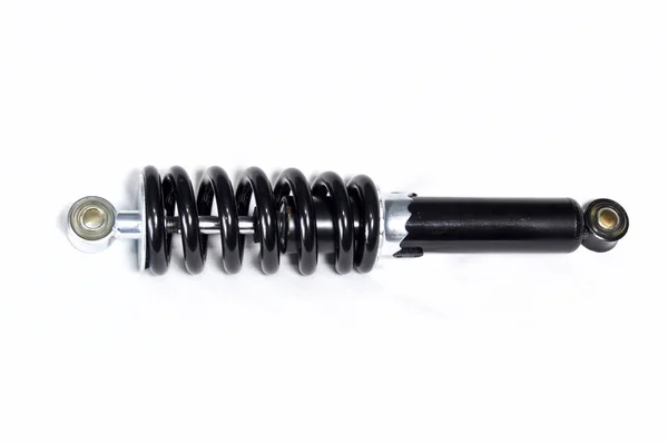 Black motorcycle shock absorber on white — Stock Photo, Image