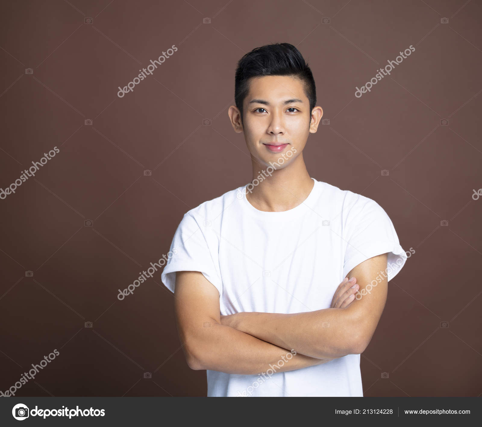 Download A Young Man With A White Shirt And Black Hair
