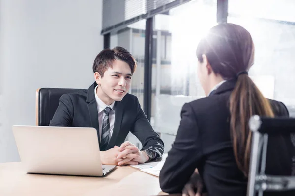 young business people discussing in office