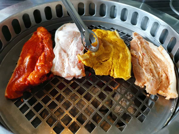 Top view of fresh meat on grill. Barbecue — Stock Photo, Image