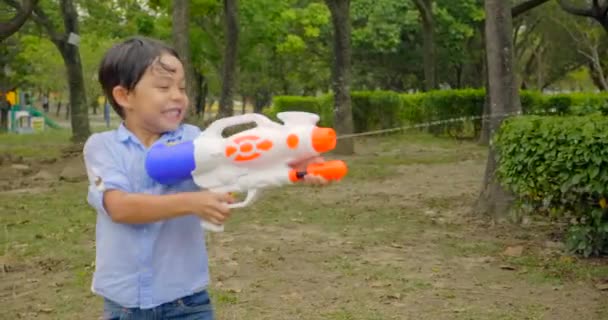 Happy Children Playing Water Guns Summer — Stock Video