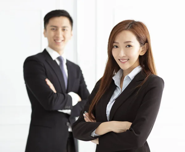 Young smiling business woman and business man — Stock Photo, Image