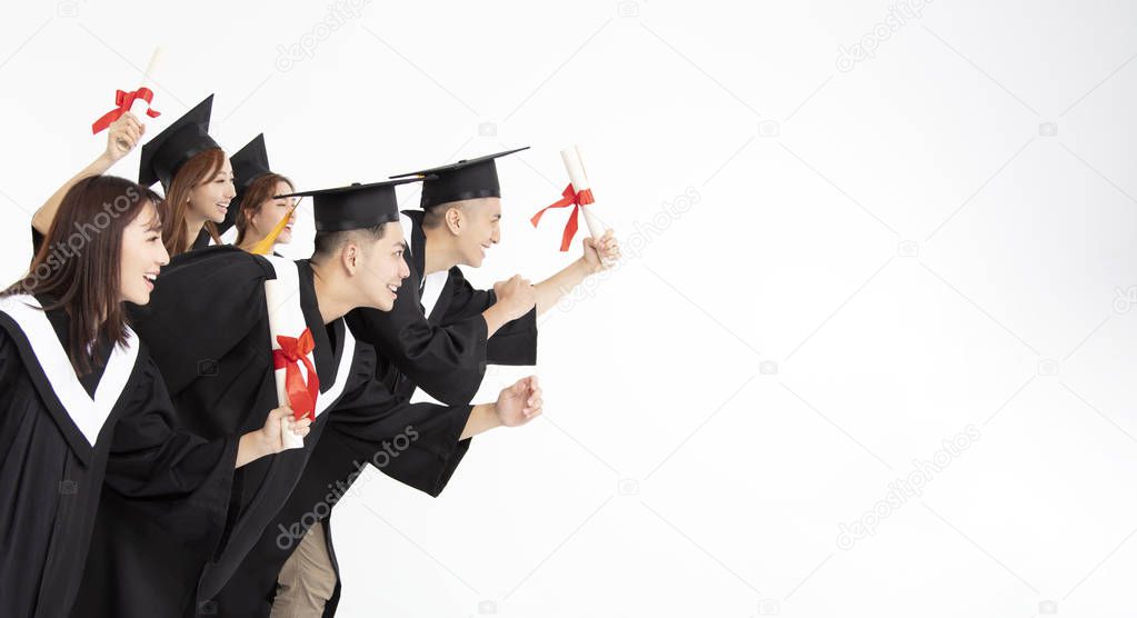 Group of Students Running and Celebrating Graduation