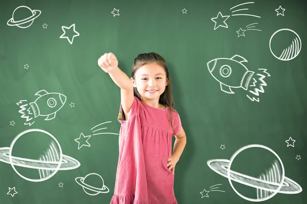 Mutlu küçük kız rüya uzay kavramları keşfetmek için — Stok fotoğraf