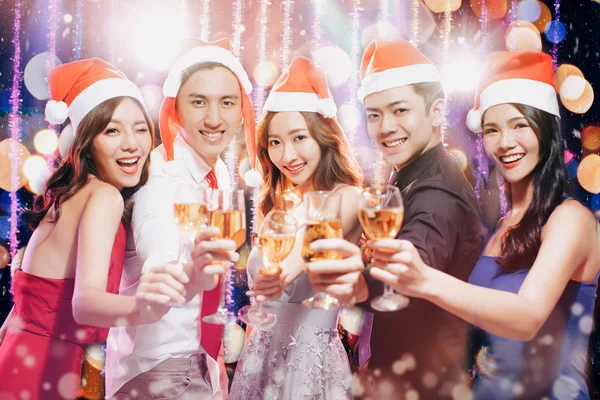 Young group having fun at New Year's and christmas party — Stock Photo, Image