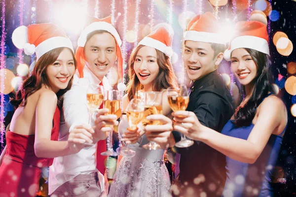 Young group having fun at New Year's and christmas party — Stock Photo, Image