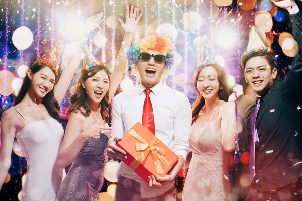 Happy young group enjoy birthday party in night club — Stock Photo, Image