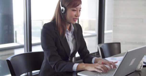 Business Woman Sitting Working Laptop Using Headset Office — ストック動画