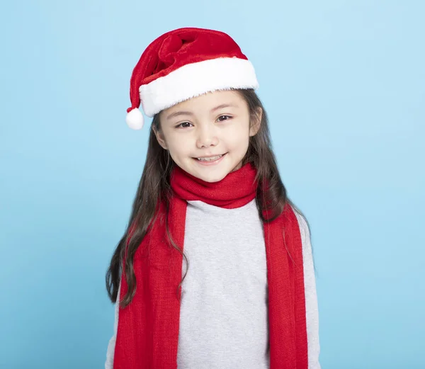 Menina feliz em chapéu de Santa — Fotografia de Stock