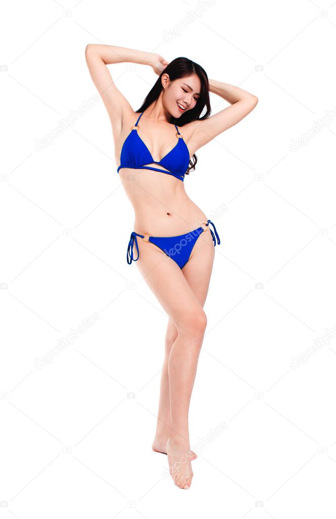 Young beautiful woman wearing swimsuit bikini , isolated on white