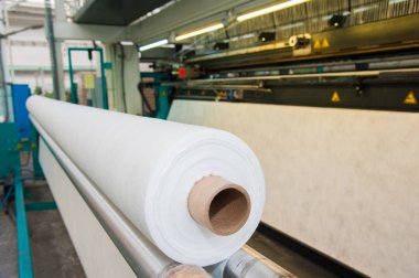 bir tekstil fabrikasında makine iplik Tekstil Sanayi - iplik biriktirir.