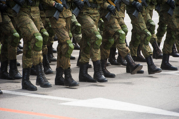 Soldiers in dress uniform marching in the parade