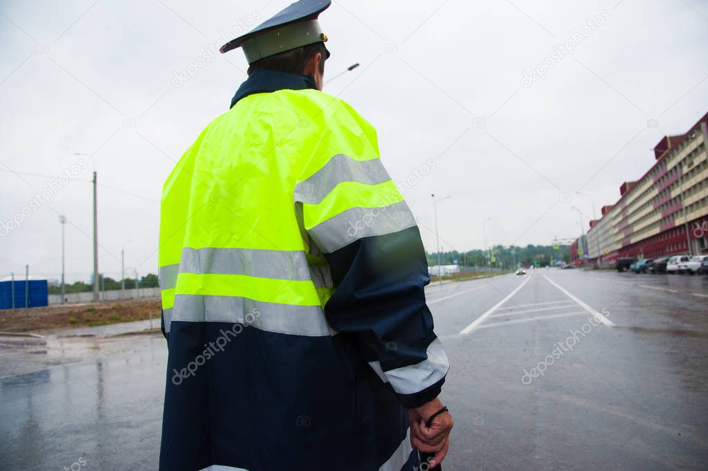 Road patrol service. Traffic cop on the road