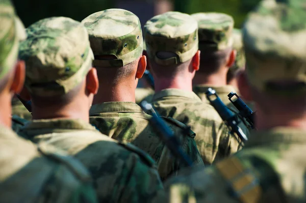 Soldiers in dress uniform marching in the parade